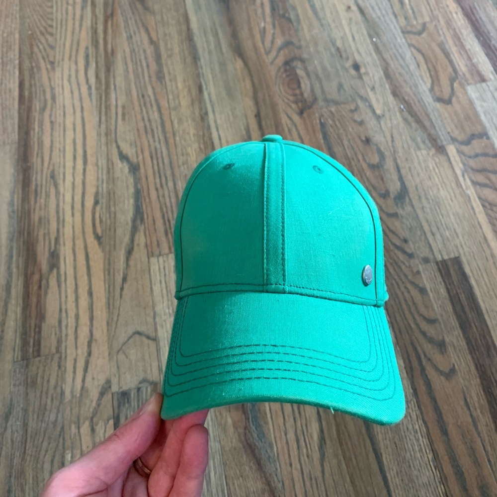 Green baseball cap